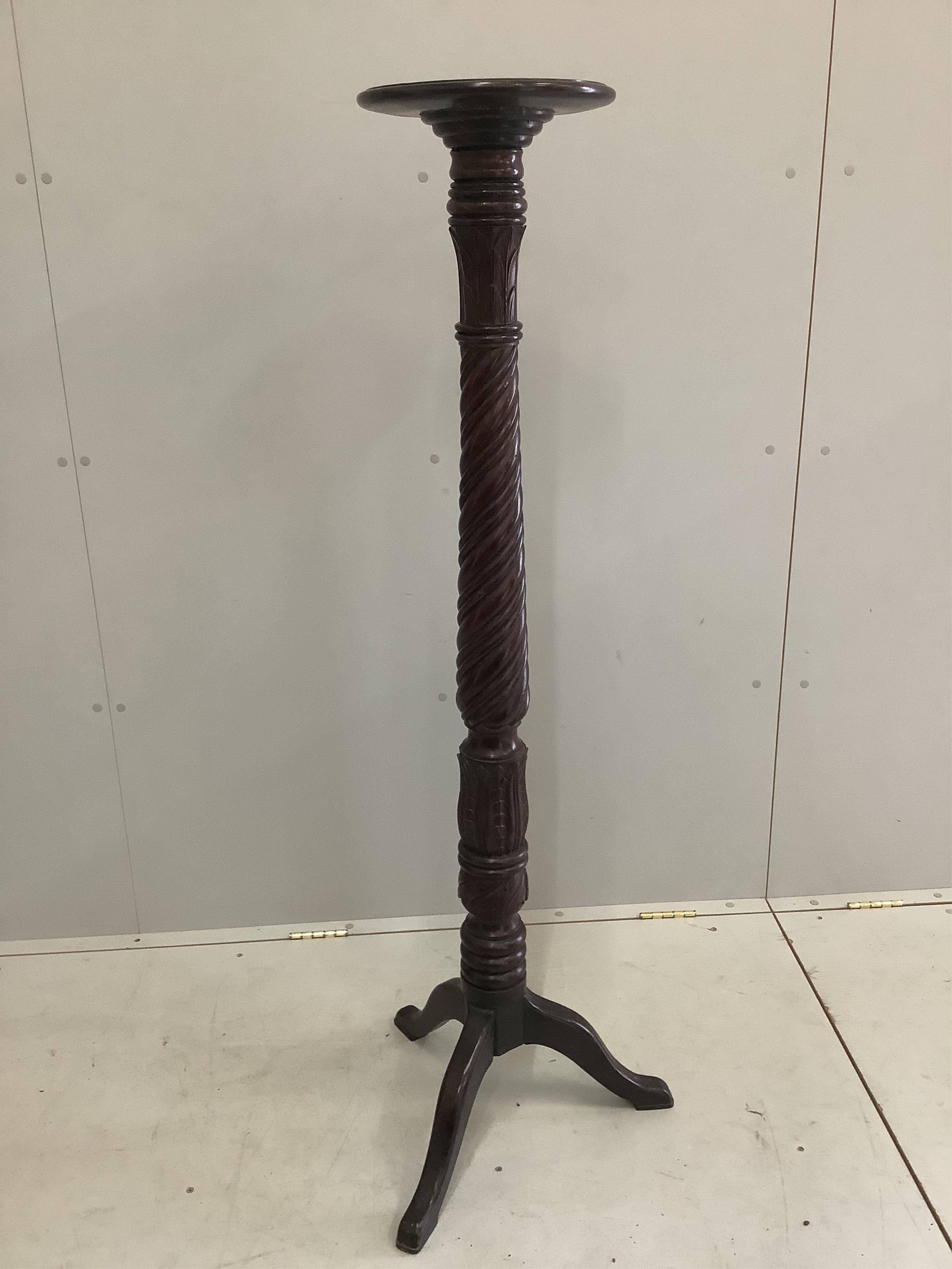 A Victorian and later mahogany bedpost torchere, height 142cm. Condition - fair